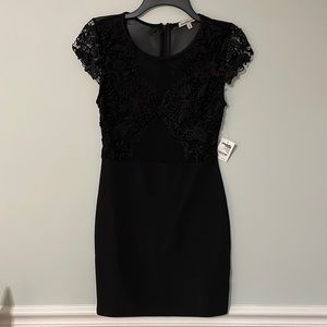 Tight black dress. Charlotte Russe brand. Shear and lace on top